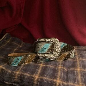 Ariat belt with stud work in the leather